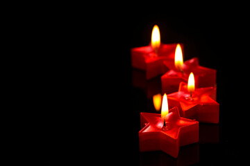 Indian festival diwali , candle on dark background