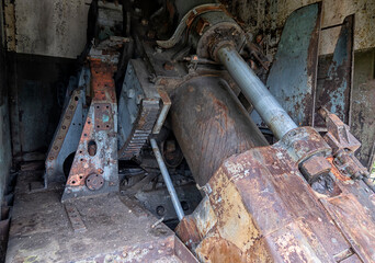 old cannon on fortifications in the city of Vladivostok. Russia. Old abandoned gun battery in...