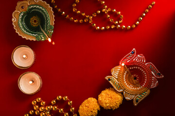 happy diwali or happy deepavali greeting card made using a photograph of diya or oil lamp