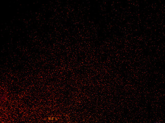 Red sparks of fire on a black background.