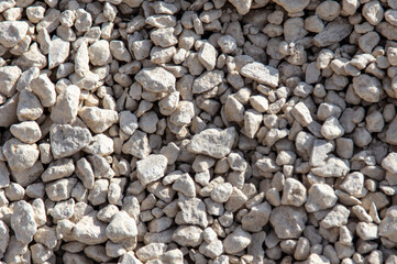 Stone gravel at a construction site as a background.