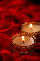 Indian festival diwali , candle on dark background
