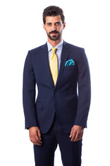 A young man wearing a black suit on a white background