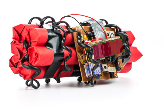 Closeup of home made bomb with digital display, wires and circuit board.