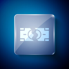 White Tearing apart money banknote into two peaces icon isolated on blue background. Square glass panels. Vector.