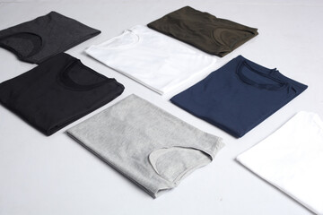 collection of t-shirts isolated on white background. Flat lay tees template