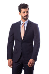 A young man wearing a black suit on a white background