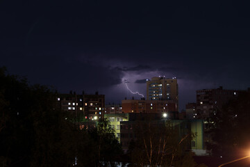 Lightning in the city's night sky
