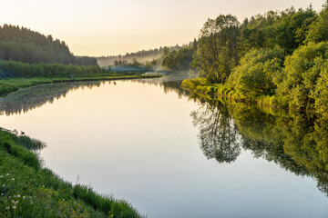 Evening smoke over the river