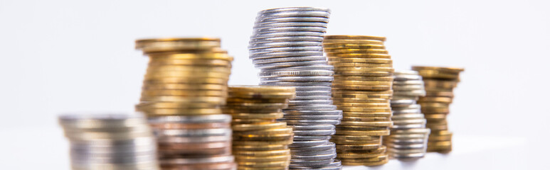 collection of colorful metal coins isolated on white background, close view 