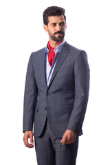 A young man wearing a black suit on a white background