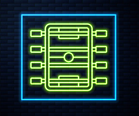 Glowing neon line Hockey table icon isolated on brick wall background. Football table. Vector.