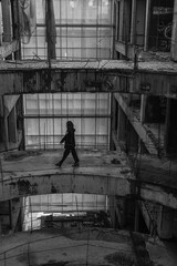 
girl in an abandoned building