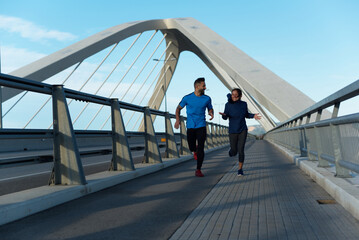 Caucasian man and Latino Hispanic woman train in the morning and have fun.