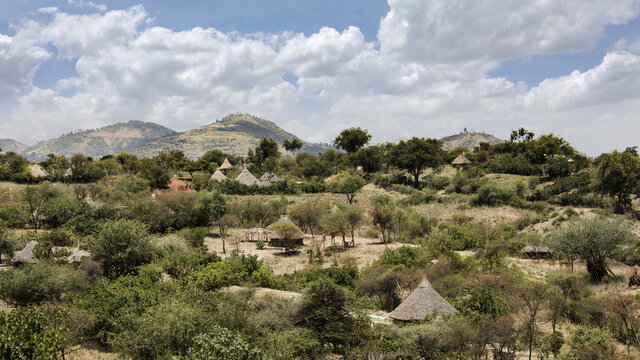Ethiopian Landscape Of Grass Huts And Mountains In The Borana Region Of Ethiopia.