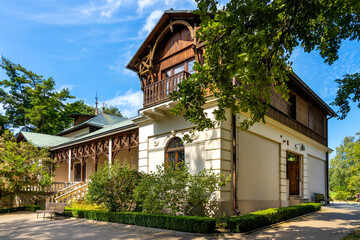 Side view of historic manor house and museum of Henryk Sienkiewicz, polish novelist and journalist, Nobel Prize winner in Oblegorek, Poland - obrazy, fototapety, plakaty