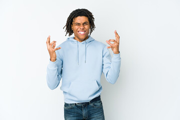 Young african american rasta man screaming with rage.