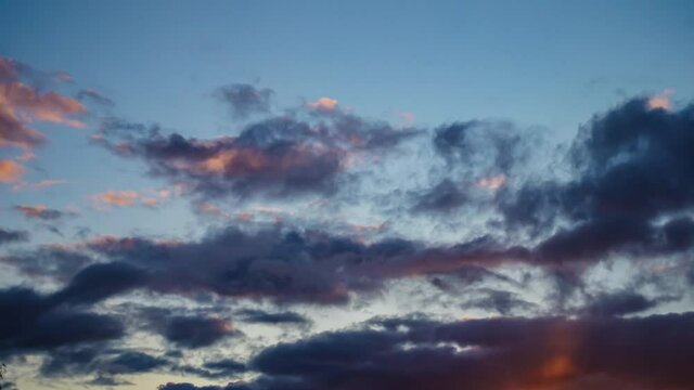 white clouds over sunset sky time