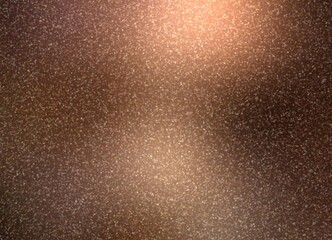 Brown metal polished background covered small glitz bokeh.