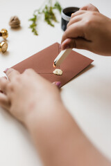sealing wax is dropped on the brown envelope for printing
