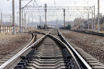 Fototapeta na wymiar Railway rails stretching into the distance. The end of the Trans-Siberian Railway in Vladivostok.