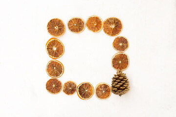 Christmas background. Dried orange sliced frame.