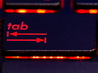 Black keyboard tab key with red backlight