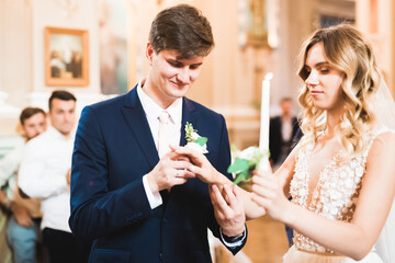 Wedding couple bide and groom get married in a church
