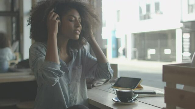 Black African America Girl Relaxing in Coffee Shop