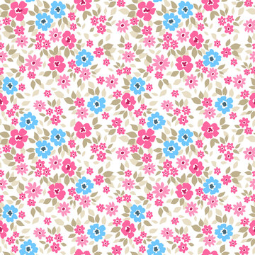 Vintage floral background. Seamless vector pattern for design and fashion prints. Flowers pattern with small pink and light blue flowers on a white background. Ditsy style.