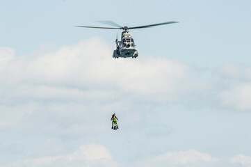 Fototapeta na wymiar Barcelona, Spain; August 6, 2018: Helicopter of spanish Army in rescue mission. Aerospatiale SA 330 Puma