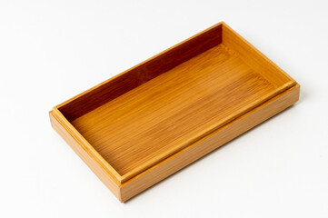 open wooden box top view on white background