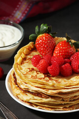 Russian cuisine national dish bliny with fresh berries