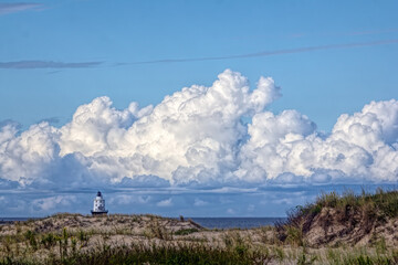 Massive Clouds Behind Lighthouse © francis