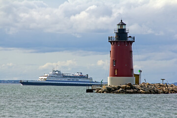 Ferry Passing Lighthouse