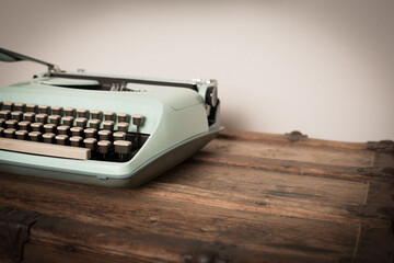 Vintage Typewriter Sitting on Old Wooden Trunk, Room for Text
