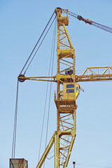 Lifting faucet on a background sky