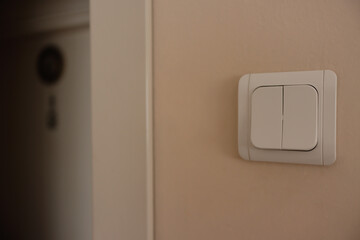 Double Button Light Switch On The Wall