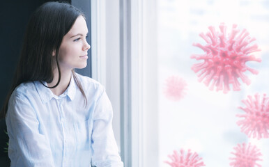 Coronavirus quarantine concept. Young woman looking at covid19 viruses outside. Stay at home self isolation.