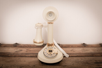 Vintage Candlestick Telephone Sitting on Old Wooden Trunk, Phone Communication