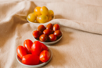 Different kind of organic tomatoes in a bowl. 