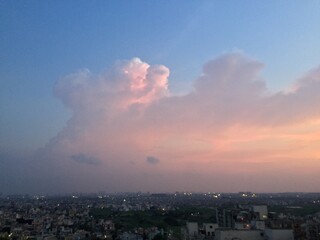 time lapse of clouds over sunset