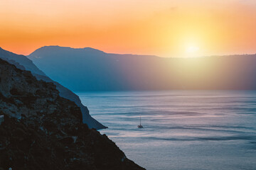 Amazing view of ocean at sunset from a volcano in oia santorini greece