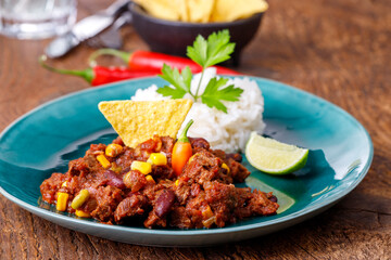 chili con carne on wood