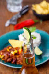 chili con carne on wood