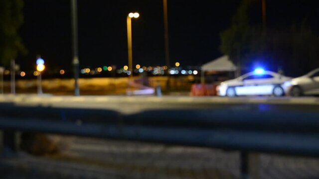 low light soft focus. views from the car to the police checkpoint quarantine coronavirus at night. 