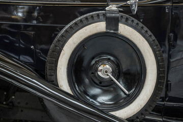 Spare tire of a vintage car.