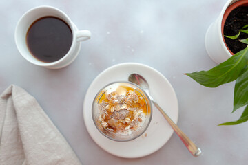 cup of coffee with a spoon and sugar