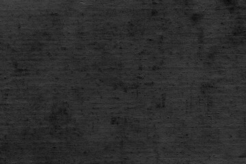 Black natural linen texture as a backdrop. Abstract cotton towel mockup template fabric on the background. Cloth wallpaper of artistic grey wale linen canvas texture for the painting.  