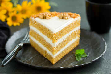 Delicious carrot cake with nuts. Selective focus.
